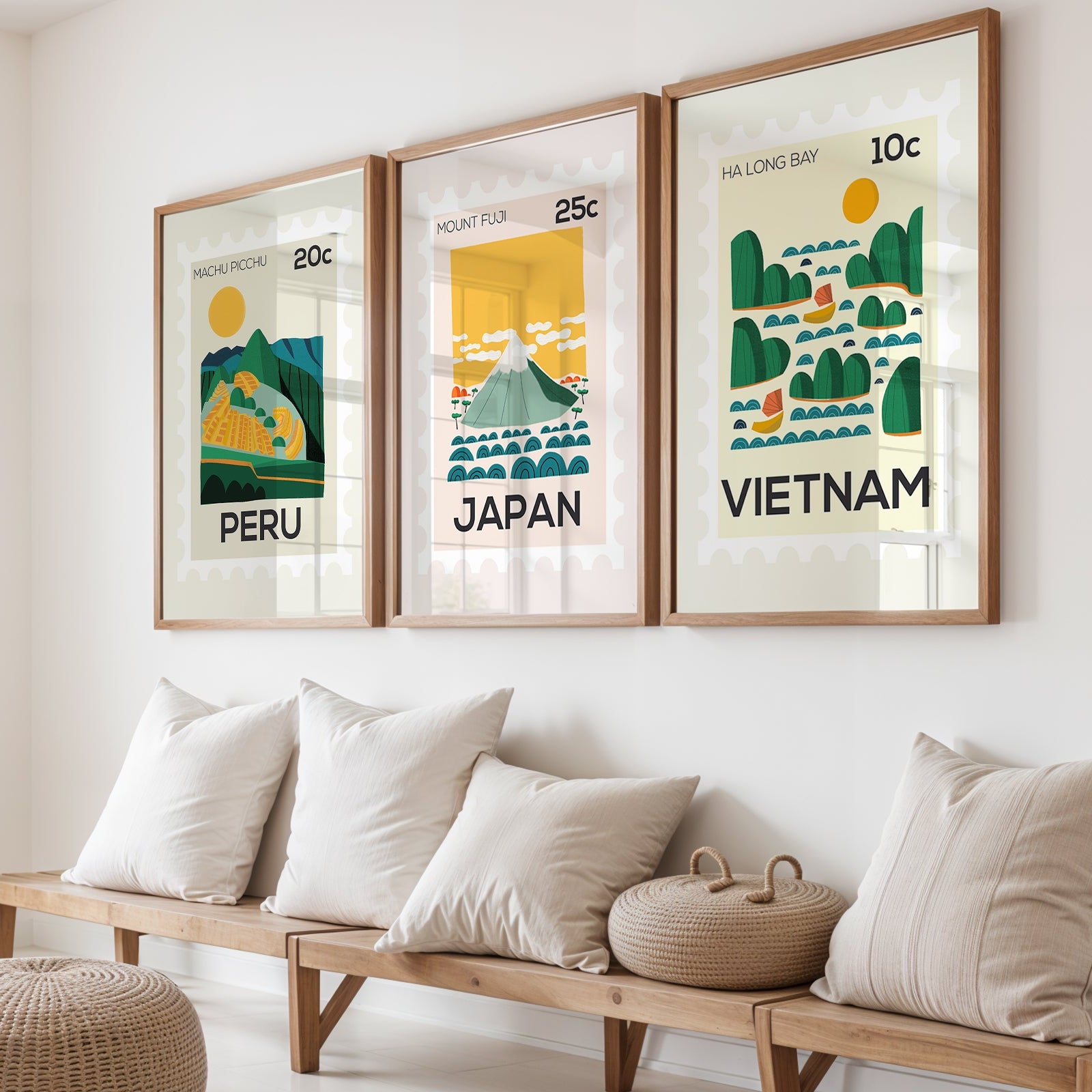 Three framed prints of Peru, Japan, and Vietnam on a wall above a wooden bench with cushions.