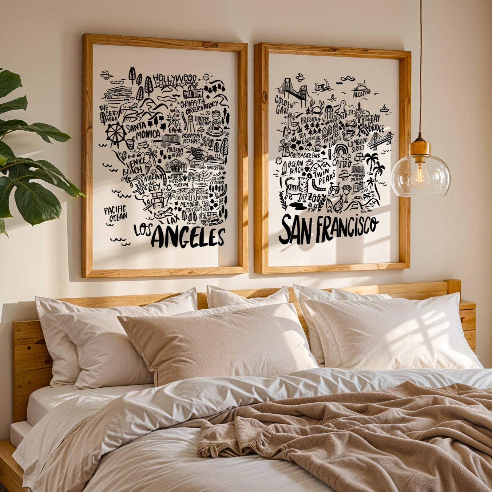 Bedroom with framed prints of Los Angeles and San Francisco on the wall.