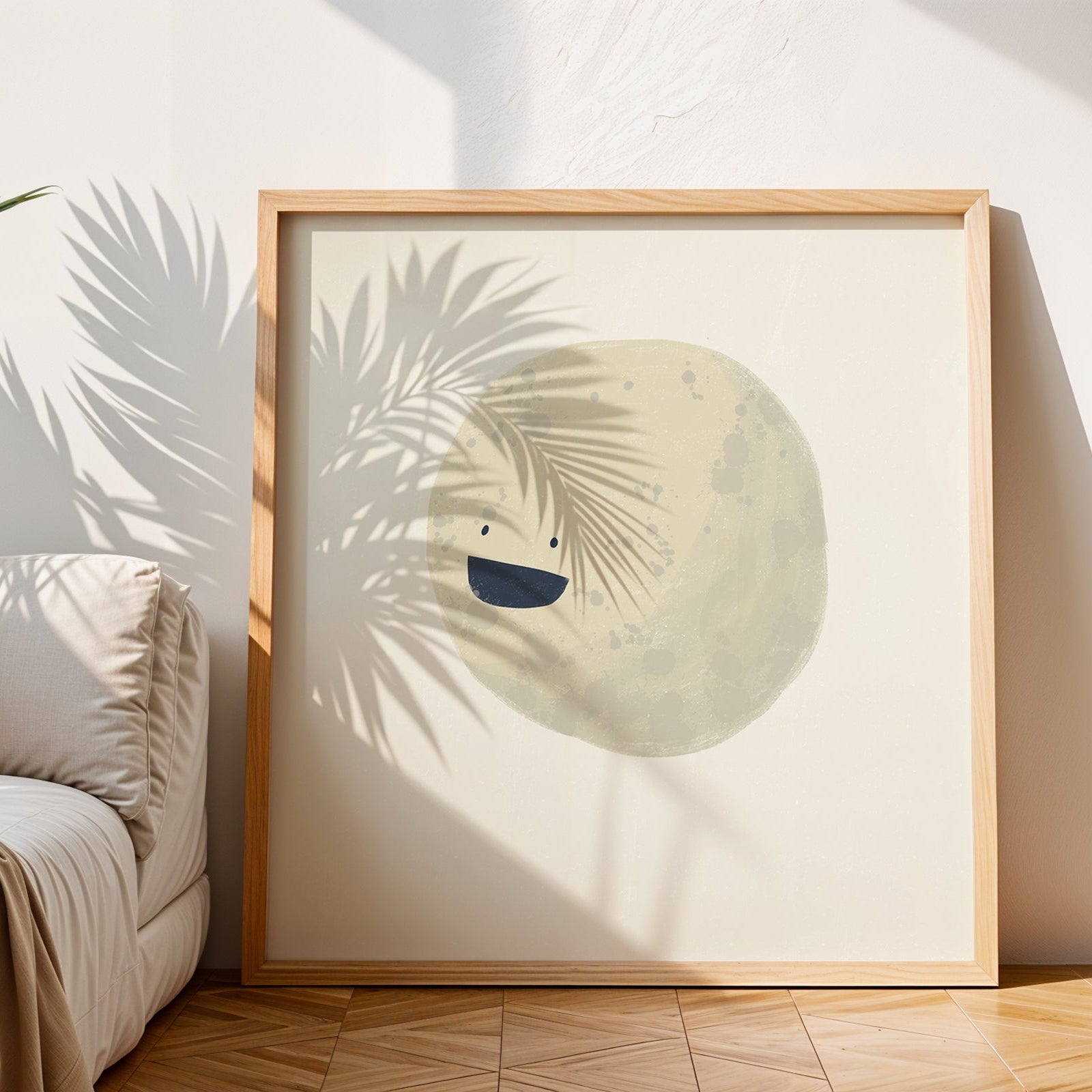 Framed artwork of a stylized face on a wall in a room with a plant and sofa.