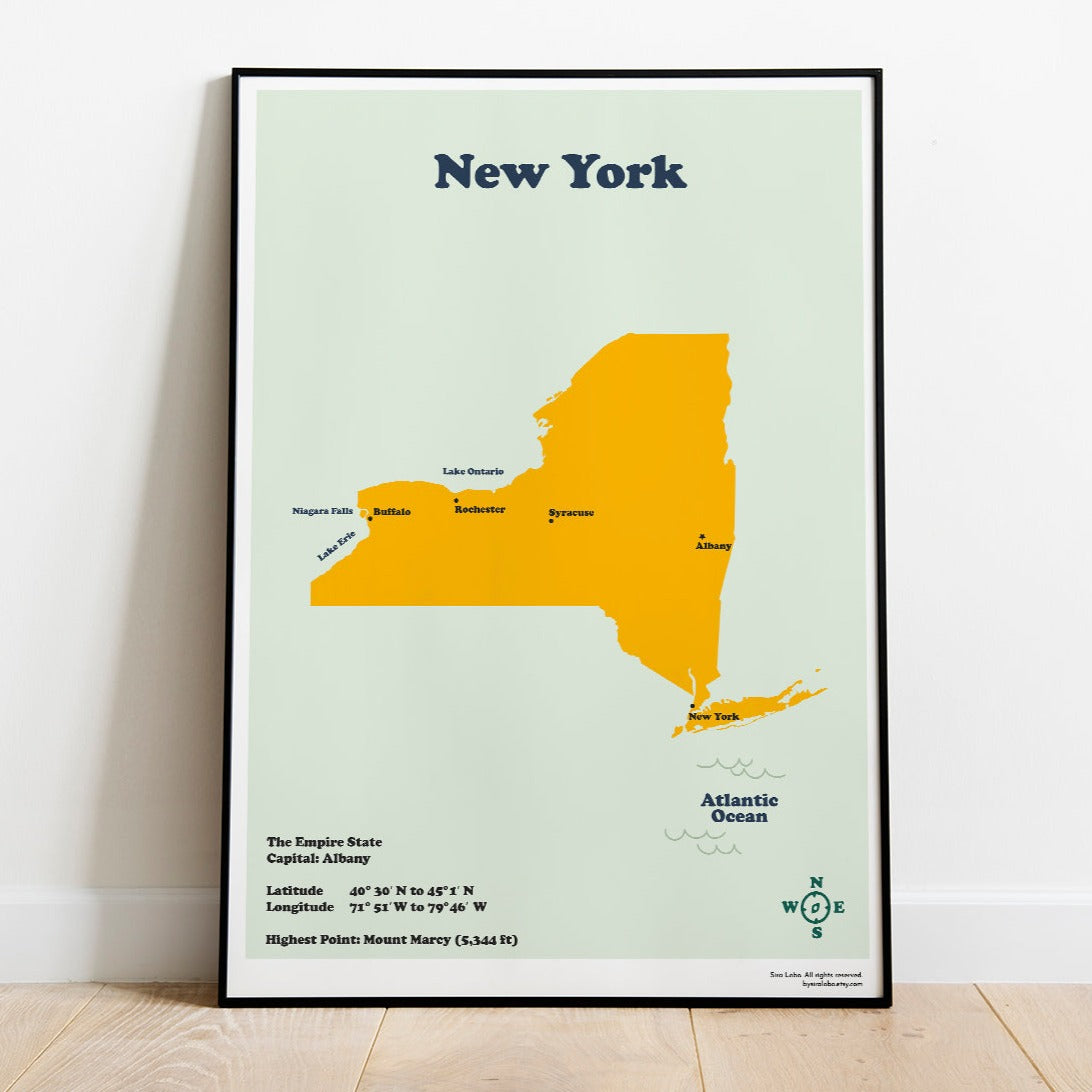 A printable map of the State of New York with the capital and major cities marked, displayed on a white wall.