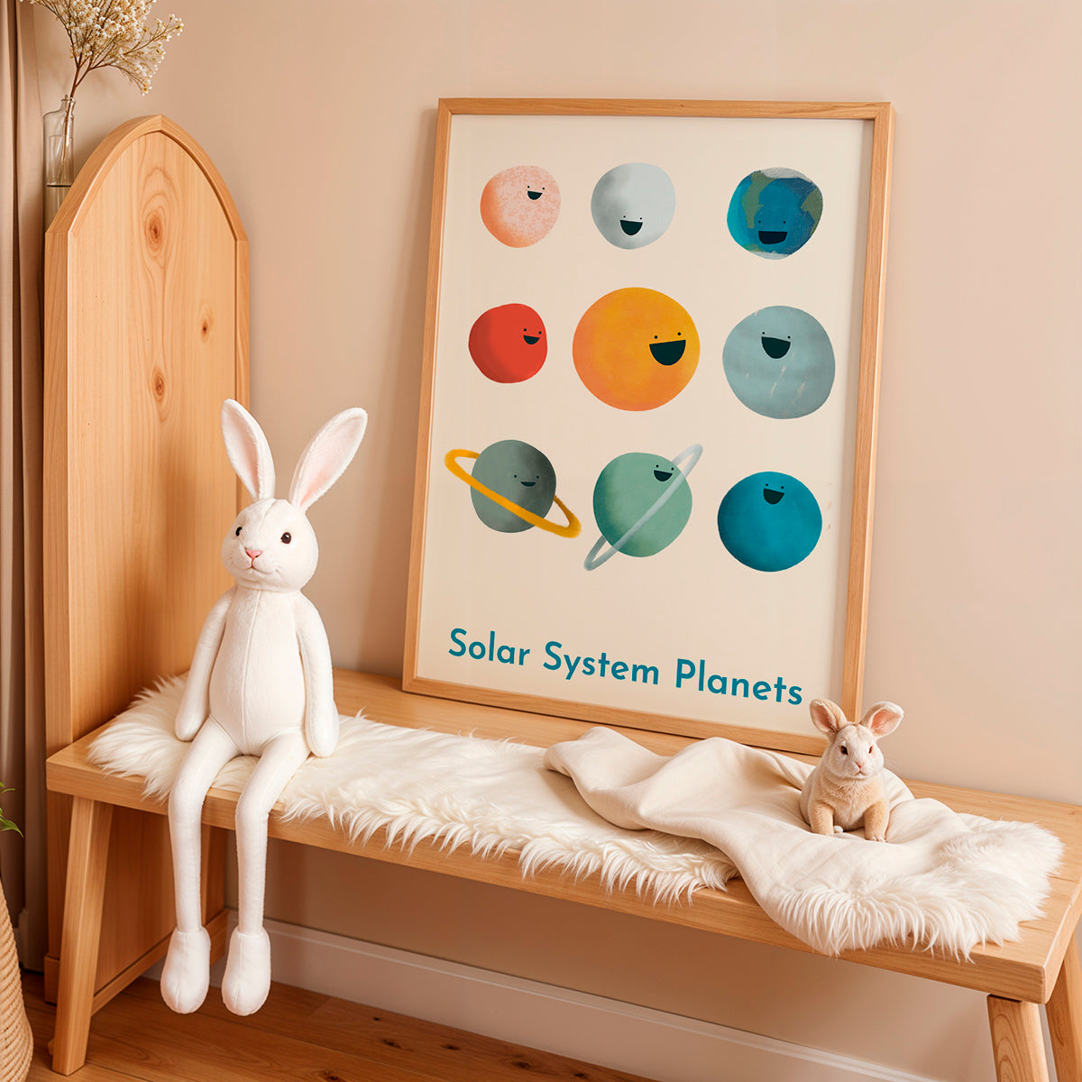 Framed 'Solar System Planets' poster on a wooden bench with plush toys.