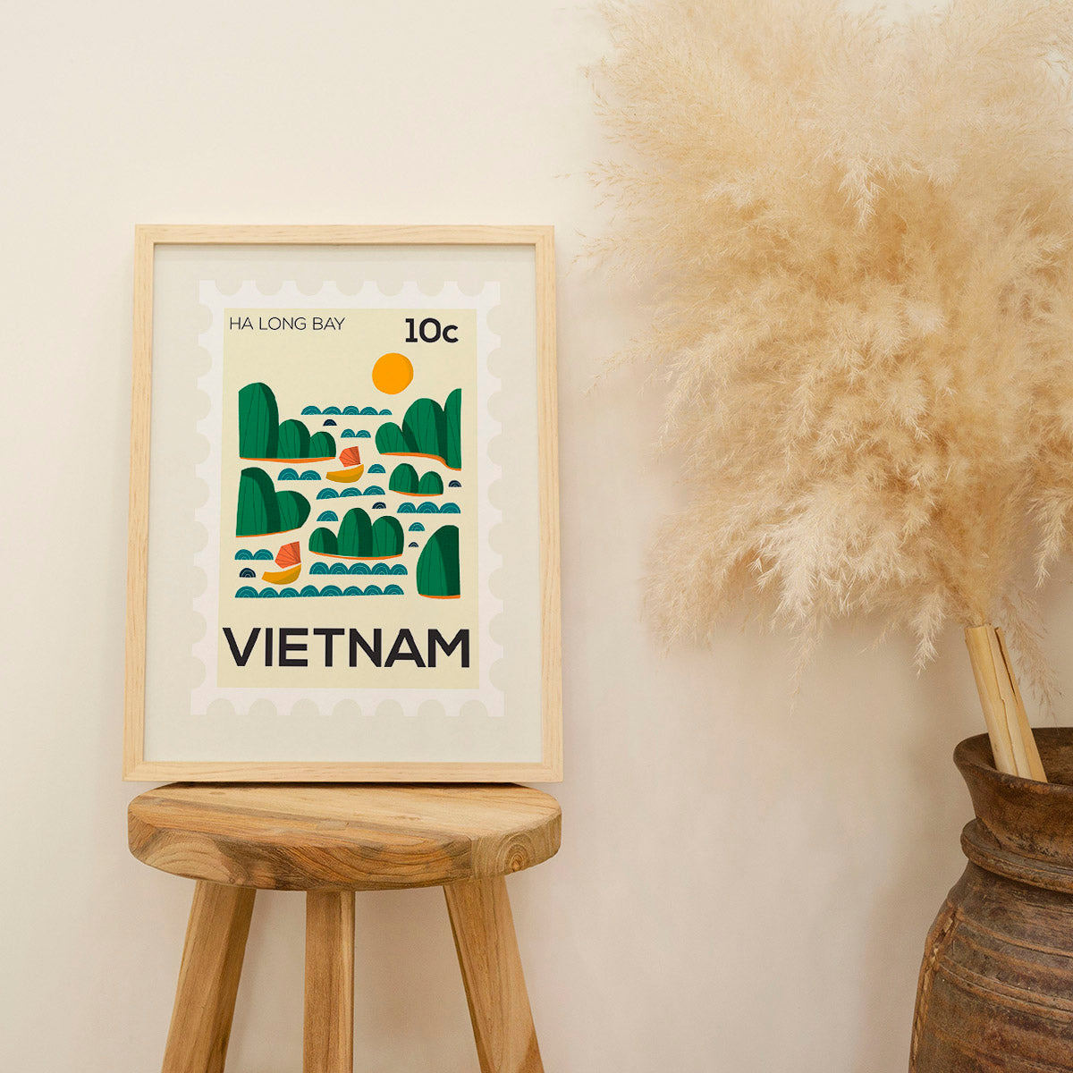 Framed artwork of Vietnam on a stool with decorative elements