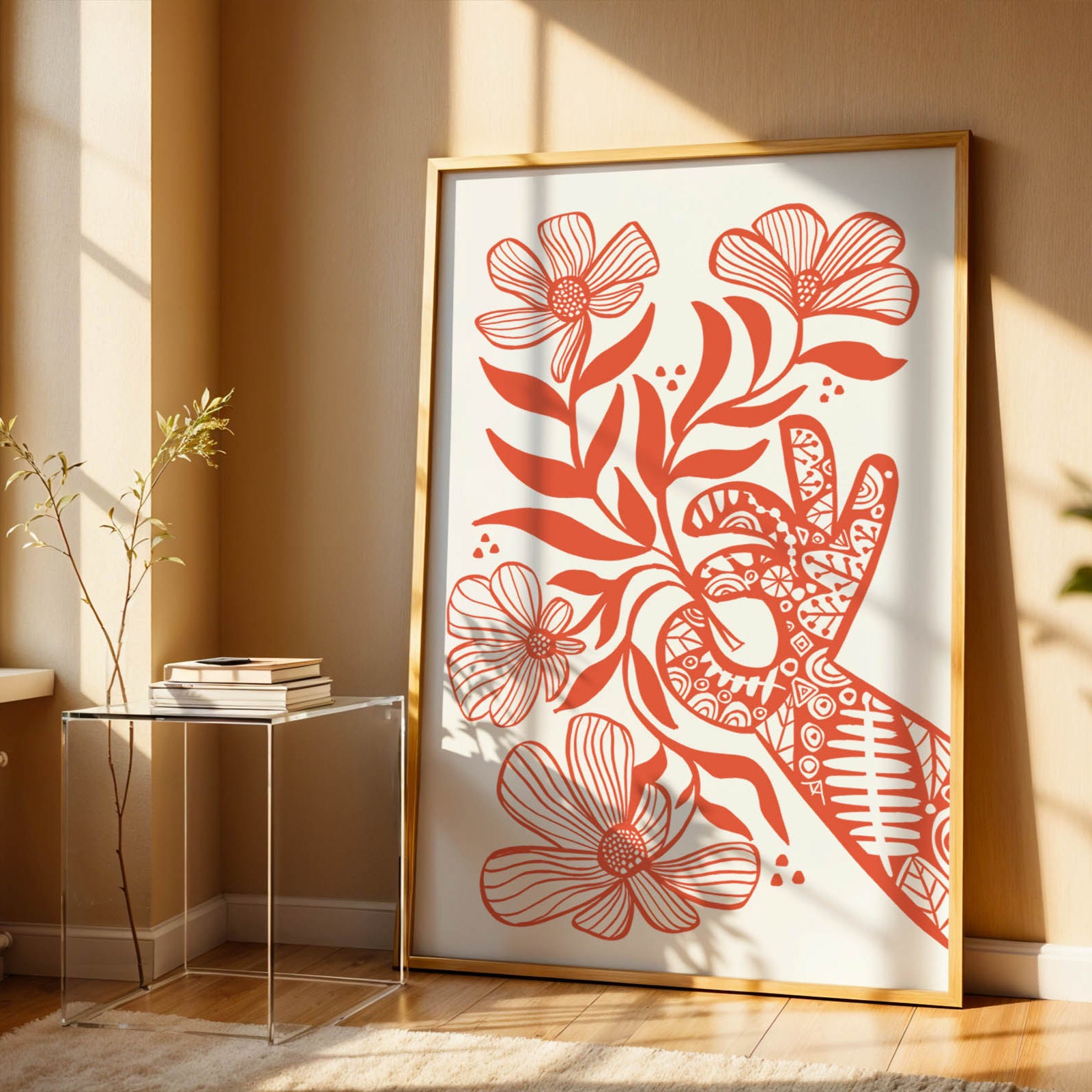 Framed floral artwork on a wall in a sunlit room