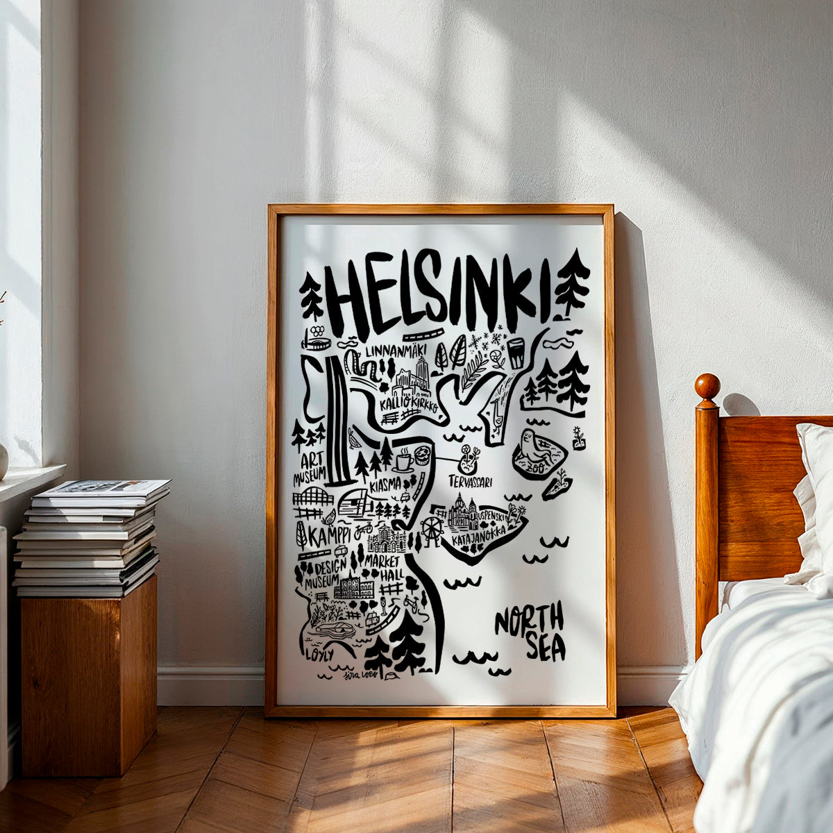 Framed map of Helsinki on a wall in a bedroom