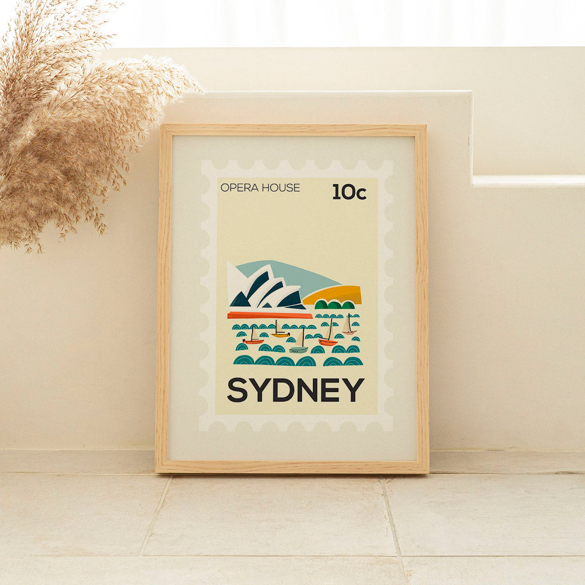Framed poster of the Sydney Opera House with 'Sydney' text on a light background