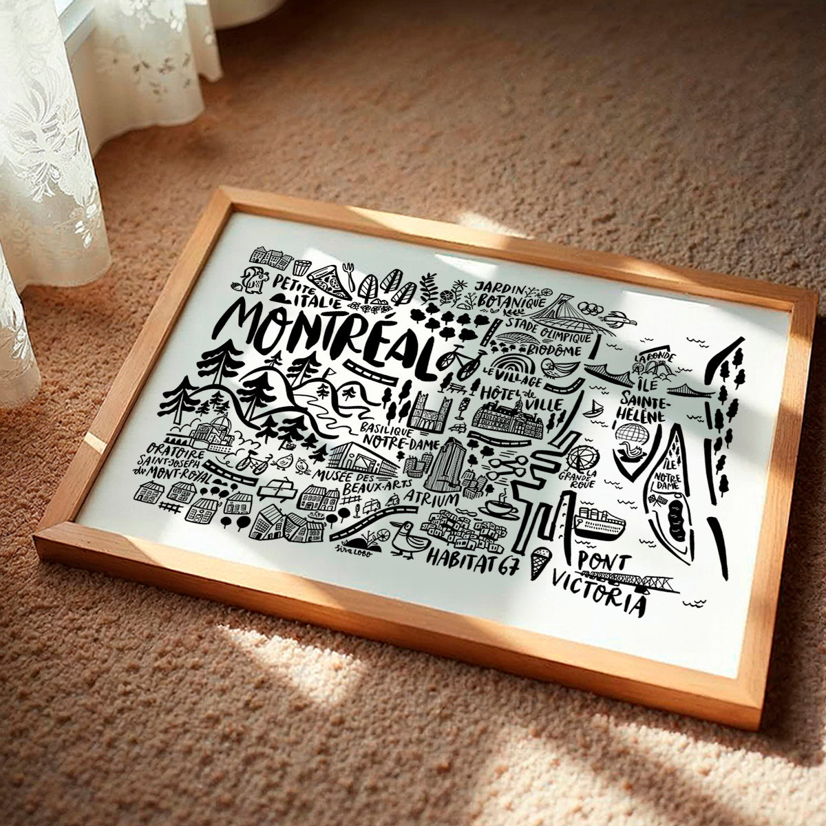 Framed black and white illustration of Montreal on a textured surface