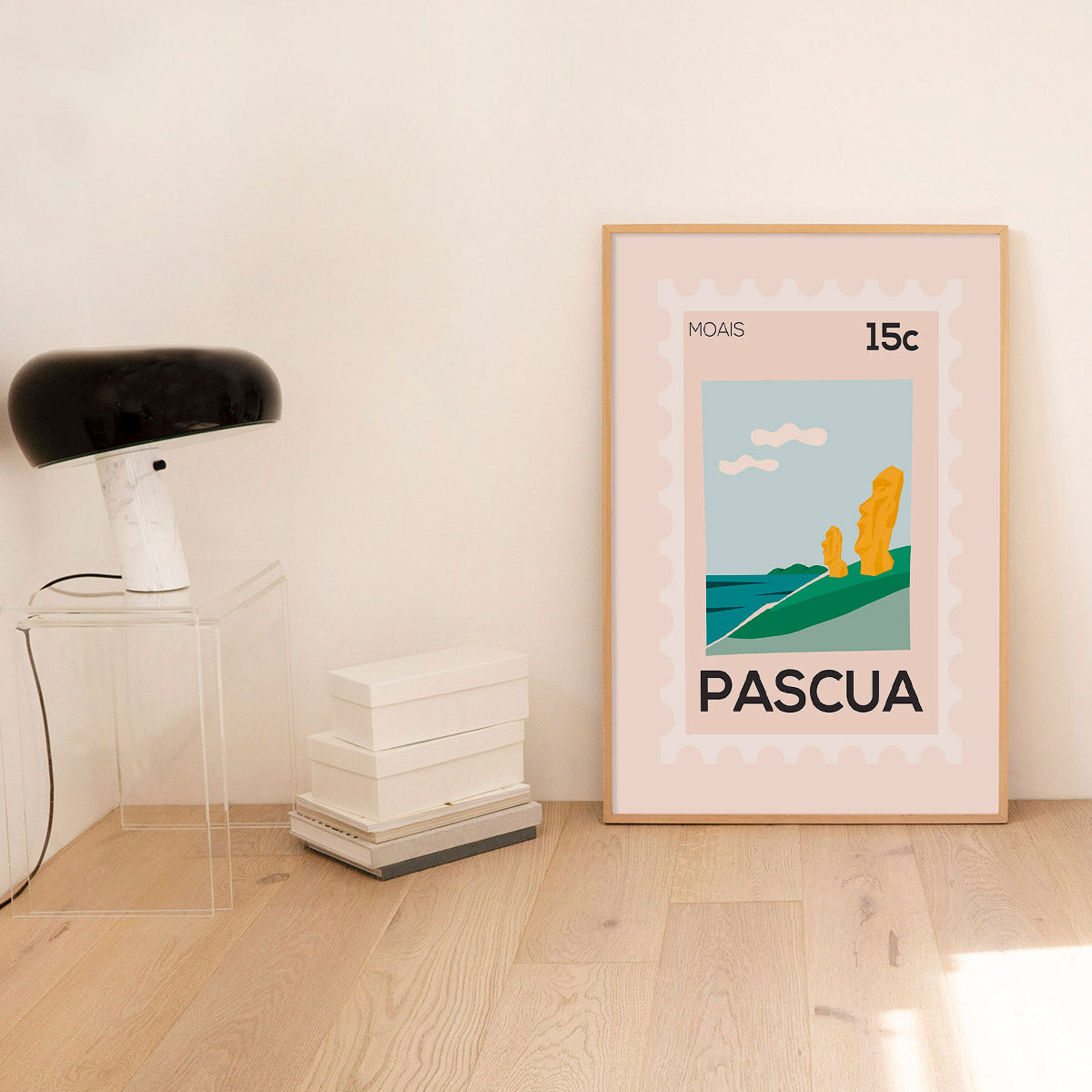 Framed artwork titled 'Pascua' on a wall with minimal decor.