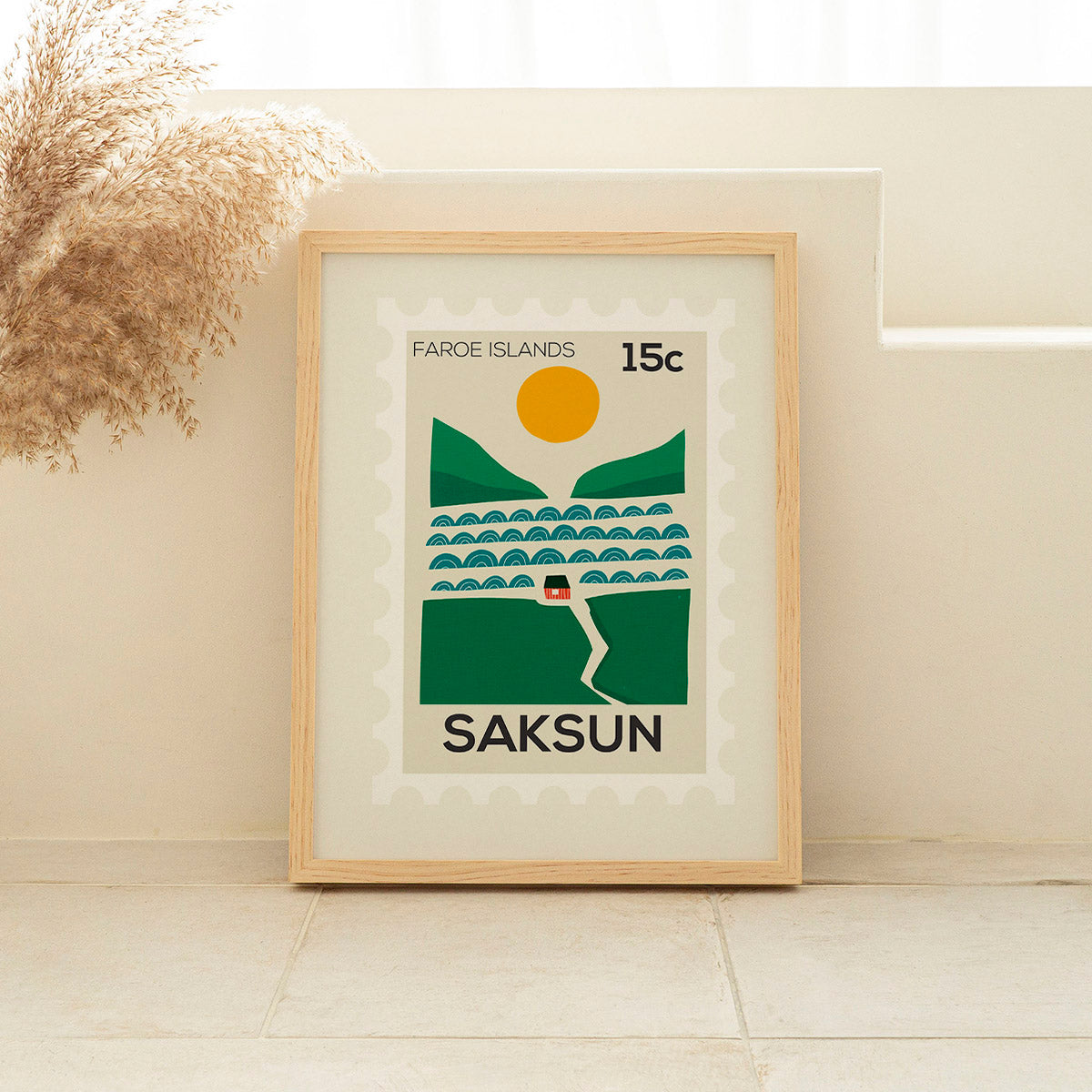 Framed poster of Saksun design on a wall with decorative elements.