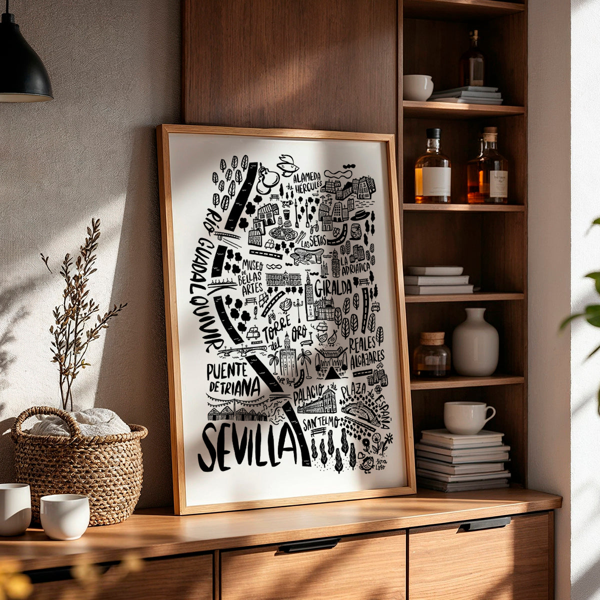 Framed map of Sevilla on a wooden shelf with decorative items.