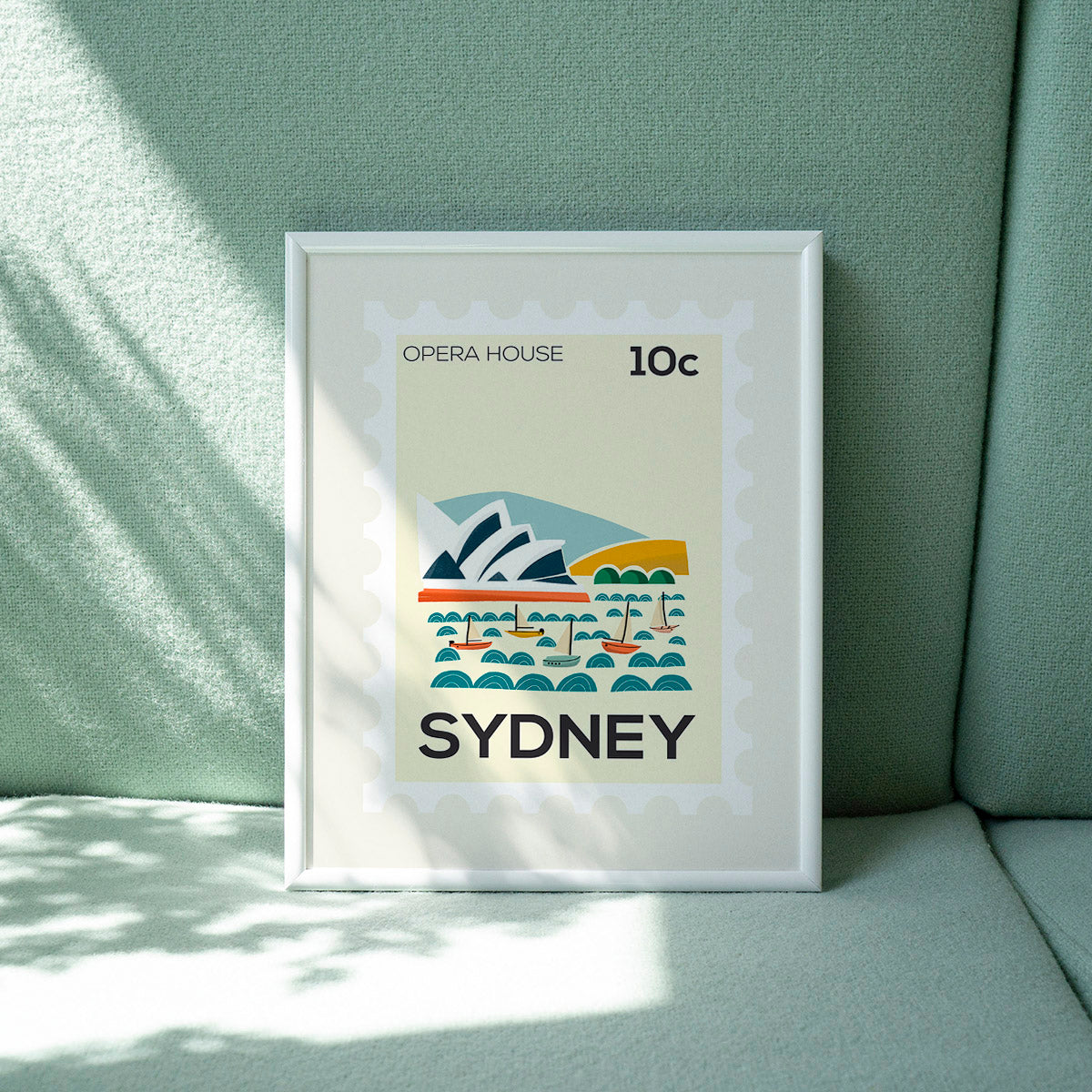 Framed artwork of the Sydney Opera House on a light green background