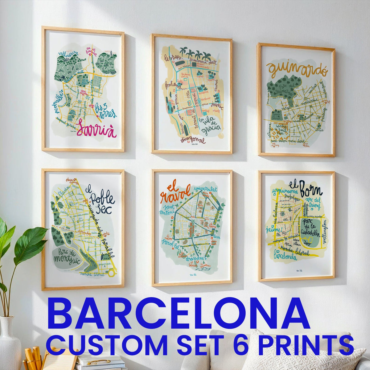 Set of six framed maps of Barcelona on a wall with decorative elements.