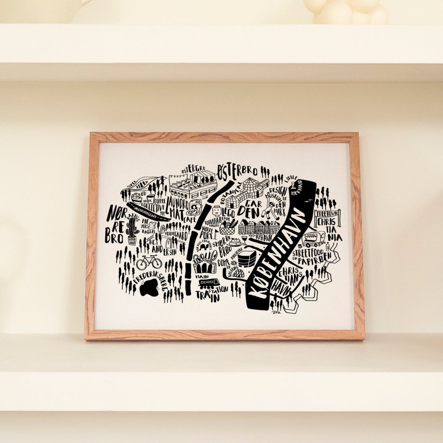 Discover Copenhagen with this black and white city map by Sira Lobo. This illustrated print highlights my favorite spots in Denmark&#39;s capital, blending style and travel memories for your home decor.
