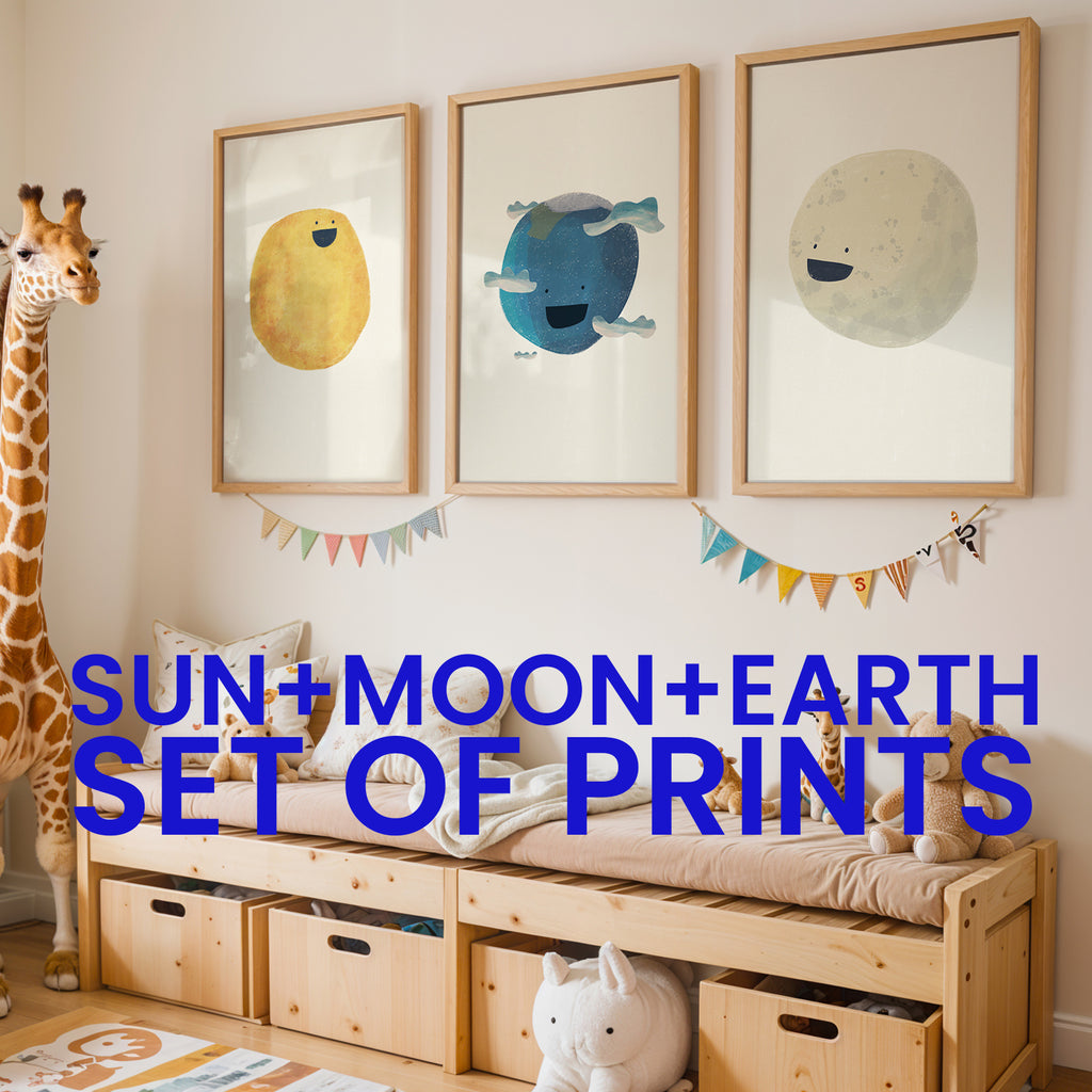 Children's room with framed prints of sun, moon, and earth, a giraffe toy, and wooden furniture.