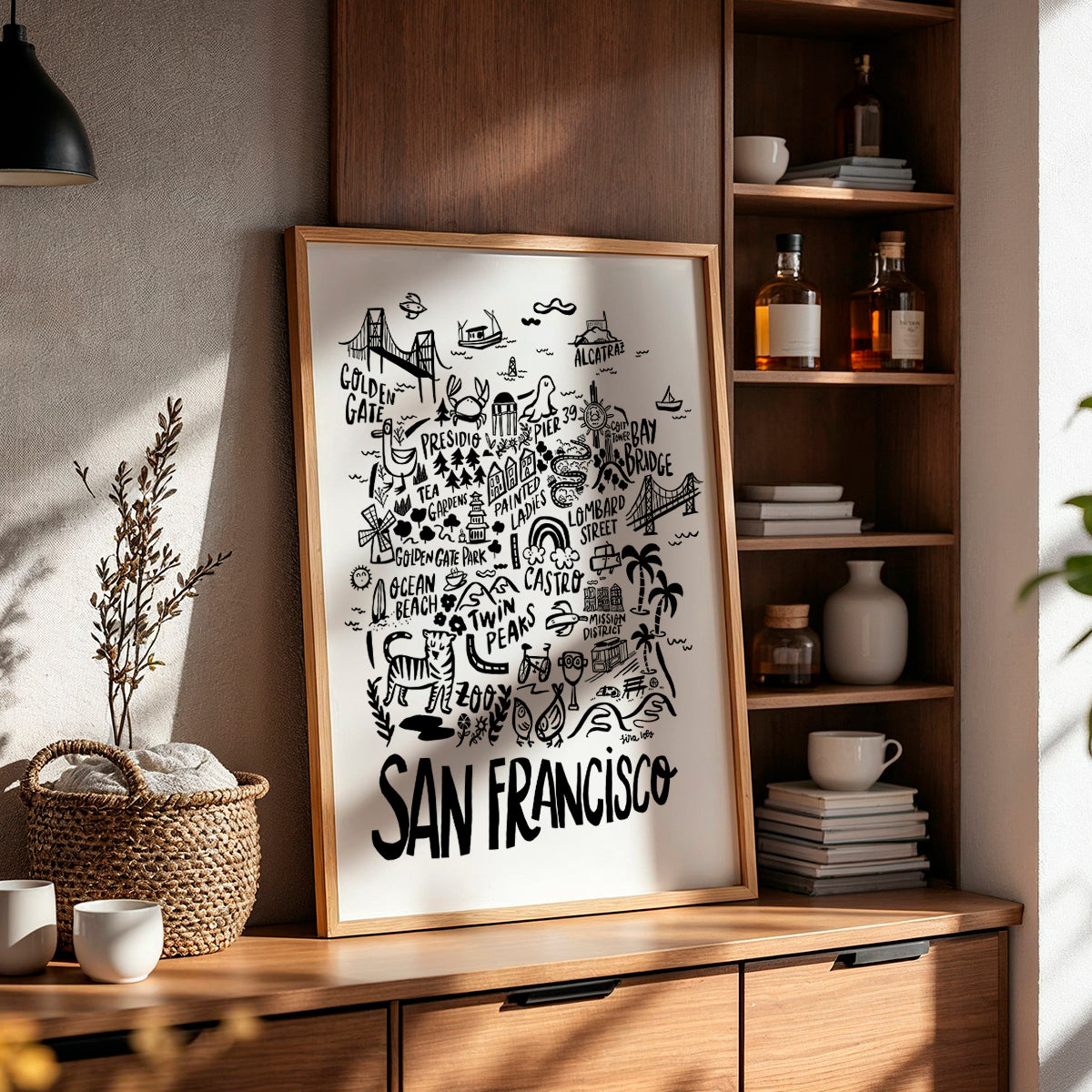 Framed San Francisco illustration on a wooden shelf with decorative items.